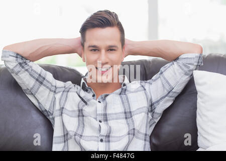 Relaxed handsome man looking at the camera Stock Photo