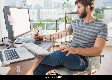 Graphic designer using a graphics tablet Stock Photo