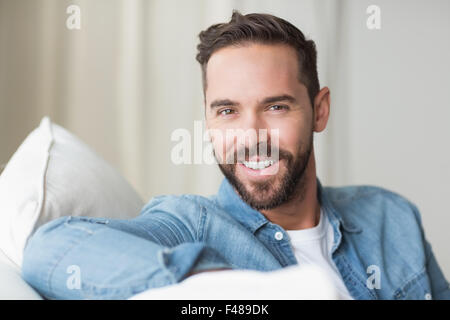 Smiling man looking at the camera Stock Photo