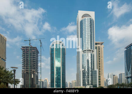 Tall skyscrapers in Dubai near water Stock Photo