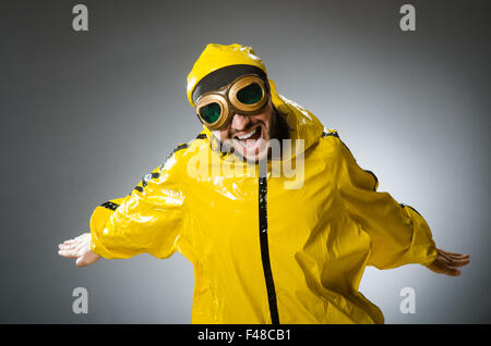 Man wearing yellow suit and aviator glasses Stock Photo