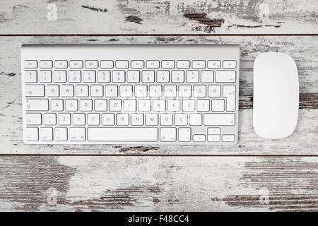 Modern wireless computer keyboard with the Turkish alphabet and white mouse Stock Photo