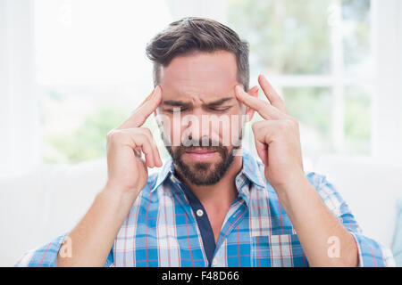 Ill man suffering from headache Stock Photo