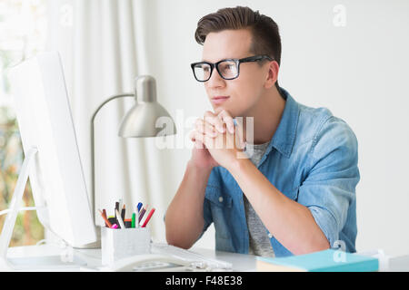 Thoughtful handsome man looking away Stock Photo