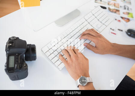Young businessman typing on the computer Stock Photo