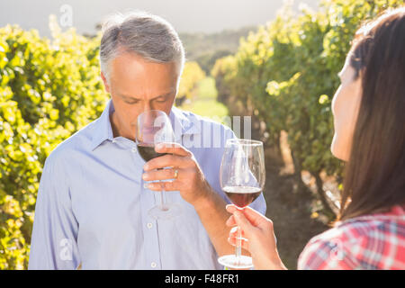 Happy couple tasting wine Stock Photo