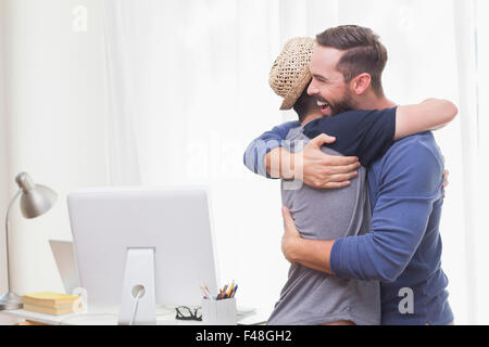 Happy homosexual couple hugging Stock Photo