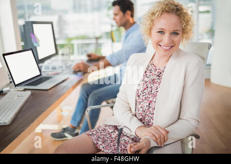 Smiling casual business team working together Stock Photo