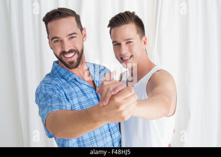 Happy homosexual couple having fun Stock Photo