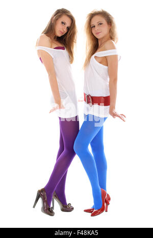 Two young woman in colour stockings Stock Photo