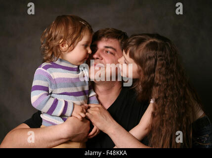 Daddy and two daughters Stock Photo