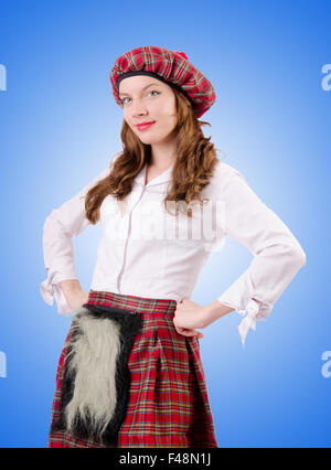 Young woman in traditional scottish clothing Stock Photo