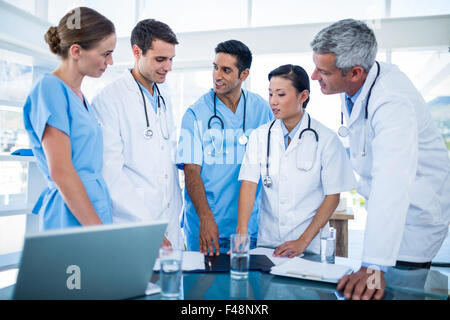 Doctors and nurses discussing together Stock Photo