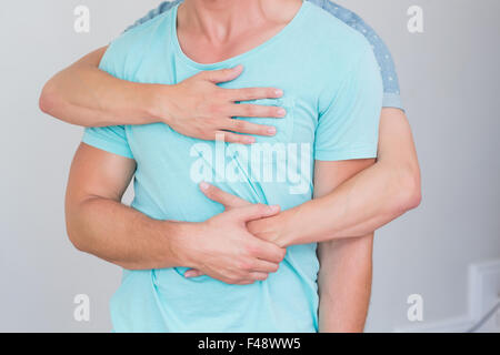 Close up view of homosexual couple hugging Stock Photo