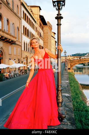 A woman dressed in a evning gown Stock Photo