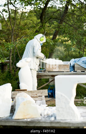 A sculptress at work outdoors, Sweden Stock Photo - Alamy