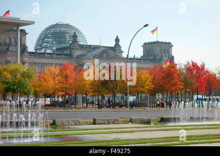 Autumn foliage and fountains in front of the Reichstag, Berlin, Germany Stock Photo