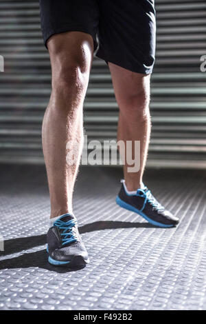 Muscular masculine legs Stock Photo