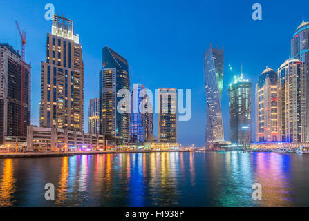 Dubai marina skyscrapers during night hours Stock Photo