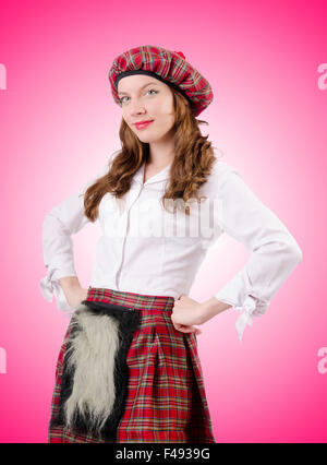 Young woman in traditional scottish clothing Stock Photo