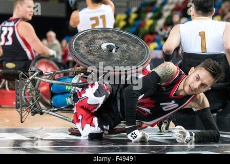 London, UK. 15th October, 2015. Trevor Hirschfield of Canada gets knocked over during the BT World Wheelchair Rugby Challenge 2015 semi-final match between Canada and Japan at The Copper Box Arena on Thursday 15th October 2015. Credit:  Brandon Griffiths/Alamy Live News Stock Photo