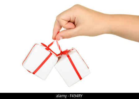 Hand holds boxes with gifts Stock Photo