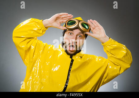 Man wearing yellow suit and aviator glasses Stock Photo