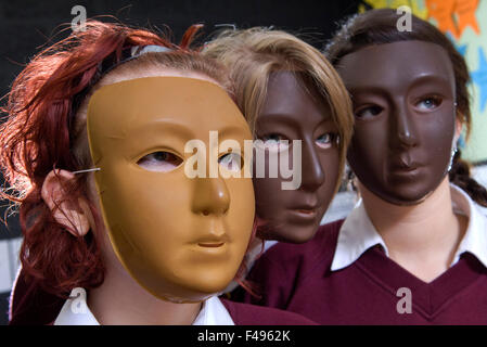 Hanham High School drama class,with girls wearing masks and lying in circle.a UK education learn classroom students pupil group Stock Photo