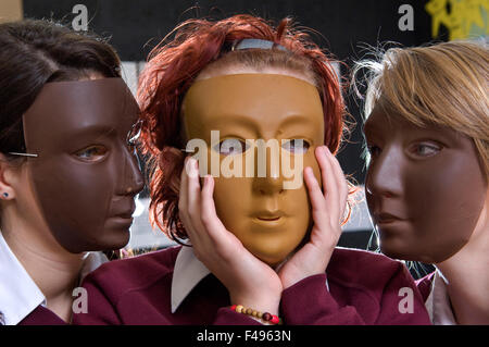 Hanham High School drama class,with girls wearing masks and lying in circle.a UK education learn classroom students pupil group Stock Photo