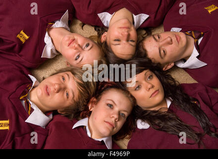 Hanham High School drama class,with girls wearing masks and lying in circle.a UK education learn classroom students pupil group Stock Photo