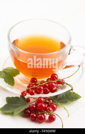 Red Currant Tea Red currant tea in a glass teapot on a dark background with berr Stock ...
