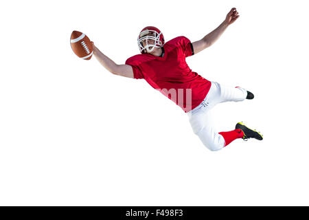 American football player scoring a touchdown Stock Photo