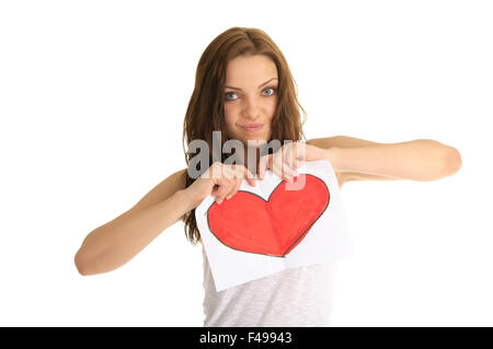 young woman breaks the painted heart Stock Photo