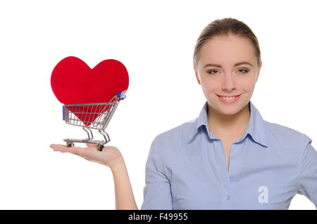 woman with heart symbol in shopping cart Stock Photo