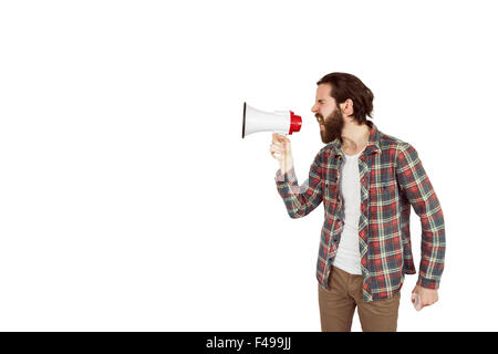 Handsome hipster shouting through megaphone Stock Photo