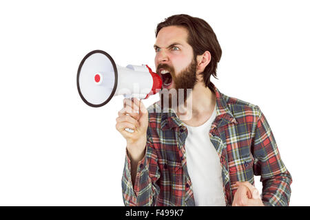 Handsome hipster shouting through megaphone Stock Photo
