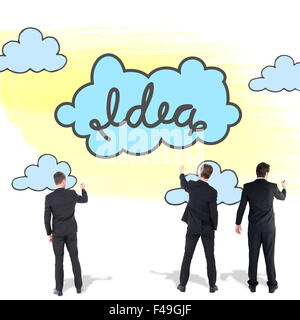 Composite image of business team writing Stock Photo