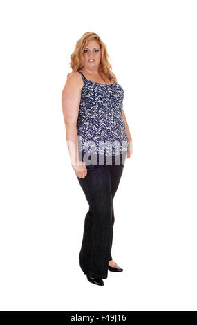 Plus size woman standing in jeans. Stock Photo