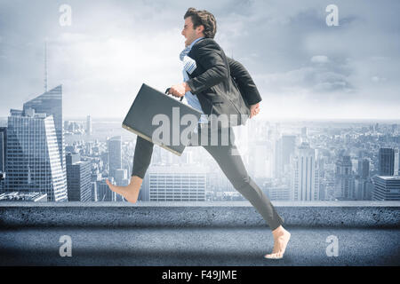 Composite image of leaping businessman Stock Photo