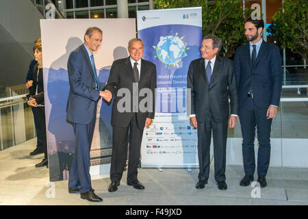 torino, Italy. 15th Oct, 2015. The Senate President Pietro Grasso (2L) handshaking with Piero Fassino (1L) Mayor of Turin, Gian Maria Gros-Pietro (3L) of Intesa SanPaolo and Enzo La Volta (4L), Councilor of the City of Turin at Intesa Sanpaolo's skyscraper before gala dinner. Credit:  Mauro Ujetto/Pacific Press/Alamy Live News Stock Photo