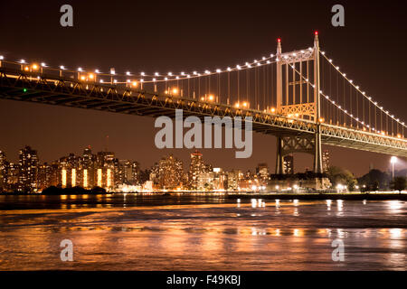 Beautiful view of the Ed Koch Queensboro Bridge in New York City looking towards Manhattan at night Stock Photo