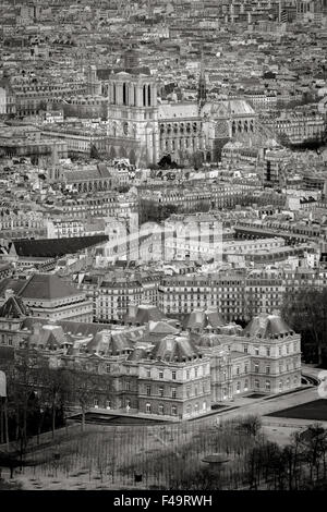 Black & White Paris rooftops from above with Luxembourg Garden and Notre Dame Cathedral. Left Bank, Ile de France, France