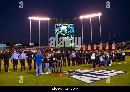Kansas City, MO, USA. 14th Oct, 2015. KCPD and KCFD member and the Kansas City Royals pay tribute to two firefighters who died on Monday night before Game 5 of the Divisional Series Playoff between the Houston Astros and the Kansas City Royals at Kauffman Stadium in Kansas City, MO. Kyle Rivas/CSM/Alamy Live News Stock Photo