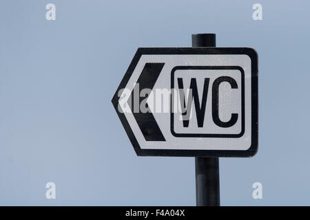 A sign directing to a WC (water closet) or toilet. Stock Photo