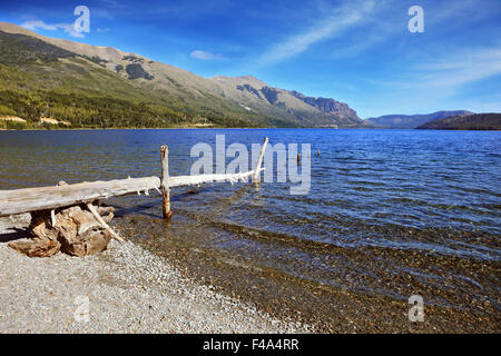 Wooden boat dock on the lake Stock Photo
