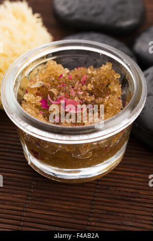 Homemade body peeling with sugar, olive oil and rose petal Stock Photo