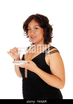 Pretty young woman drinking coffee. Stock Photo
