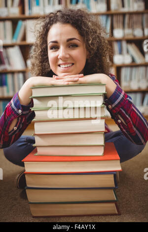 happy pretty student girl with books in classroom Stock Photo - Alamy