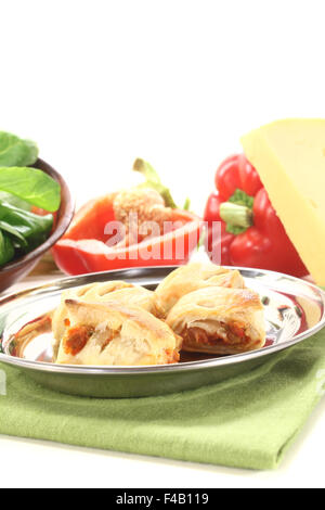 Puff pastry with bell peppers and cheese filling Stock Photo