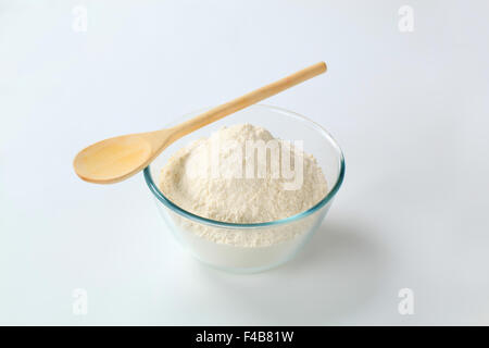 white wheat flour in a small glass bowl Stock Photo